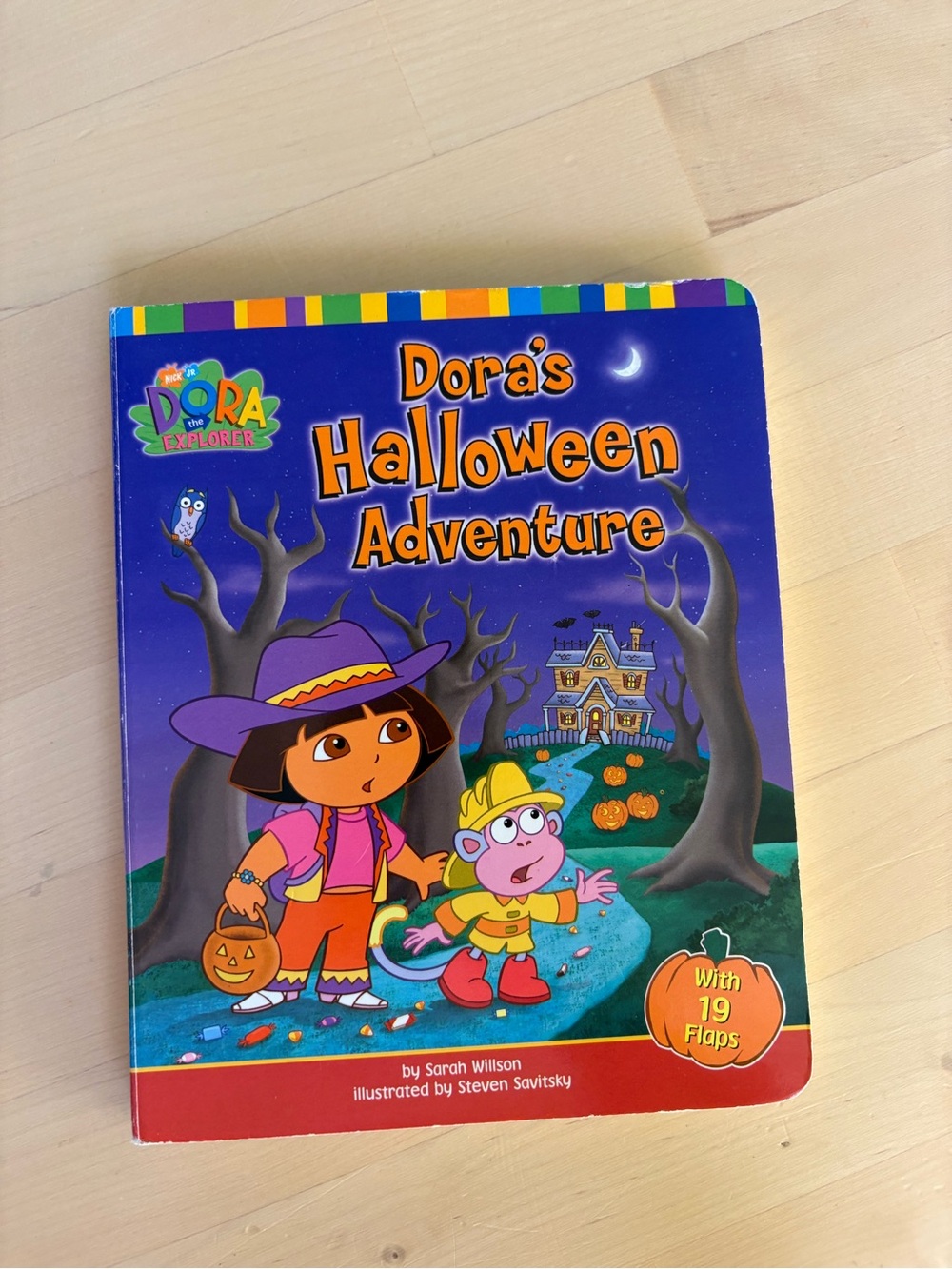 Dora's Halloween Adventure Kids Board Book with Flaps 2003